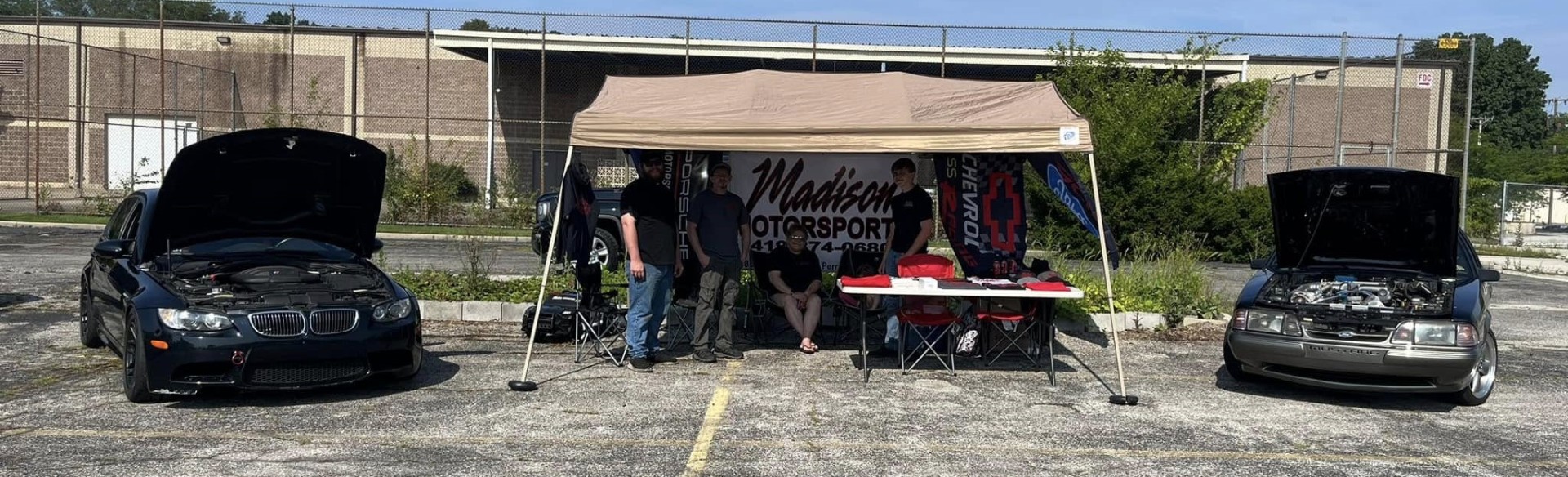 Madison Motorsports team at a car show